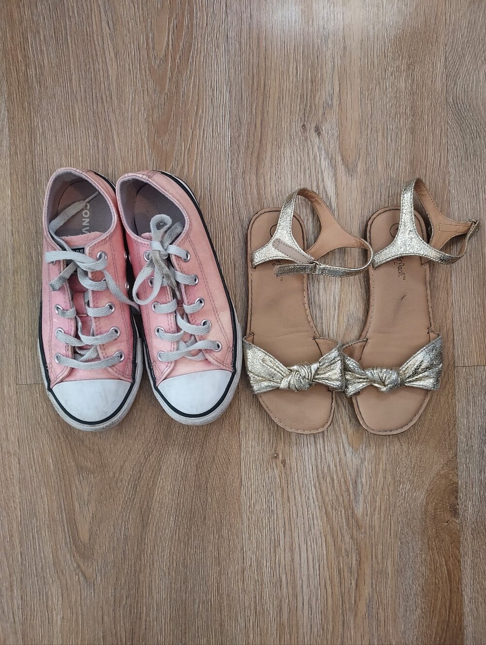 Pair Of Converse Girls Pink Canvas Sneakers And Gold Knot Sandals